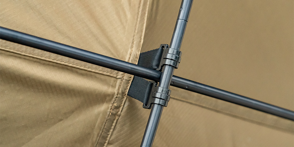 Wood vs aluminum tent poles supporting a commercial stretch tent structure